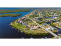Waterfront homes with private docks and beautiful landscaping in a desirable community at 17557 Ohara Dr, Port Charlotte, FL 33948