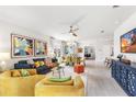 Open-concept living space flows seamlessly, featuring modern decor and an inviting atmosphere at 9374 Sunbeam Cir, Punta Gorda, FL 33950
