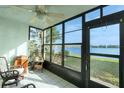 Bright Florida room featuring tile floors and scenic waterfront views at 25225 Rampart Blvd # 1701, Punta Gorda, FL 33983