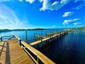 Scenic view of the dock on the water with views of other docks nearby, great for boating and recreation at 500 Woodstork Ln, Punta Gorda, FL 33982