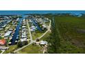 Stunning aerial view of a waterfront community with canal access and beautiful Florida mangroves at 24362 Yacht Club Blvd, Punta Gorda, FL 33955