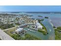 Coastal community with waterfront condominiums, a marina, and scenic water views at 1960 Oregon Trl # 2B, Englewood, FL 34224