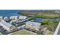 Waterfront condominiums offer serene water views, community pools and easy access to nearby marinas at 1960 Oregon Trl # 2B, Englewood, FL 34224