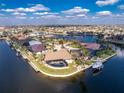 Breathtaking aerial view showcases a waterfront neighborhood with canals, private docks, and luxurious homes at 1339 Casey Key Dr, Punta Gorda, FL 33950