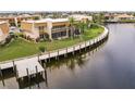 Waterfront condo building with boardwalk, well maintained landscaping and scenic views at 1080 Bal Harbor Blvd # 4D, Punta Gorda, FL 33950
