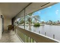 Enjoy scenic waterfront views from this covered outdoor patio with seating at 1080 Bal Harbor Blvd # 4D, Punta Gorda, FL 33950