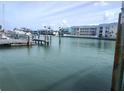 Scenic waterfront view showcases boat docks and waterway access, perfect for boating enthusiasts and waterfront living at 11723 1St E St, Treasure Island, FL 33706