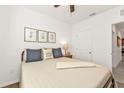 Comfortable bedroom featuring a cozy bed and neutral decor at 25120 E Lenox Cir, Punta Gorda, FL 33950
