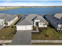 Aerial view of a single-Gathering home close to a tranquil lake at 8604 Shore Lake Dr, Englewood, FL 34224