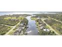 Scenic aerial view of waterway homes, showcasing waterfront living and community charm at 1417 Carswell St, Port Charlotte, FL 33953