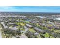 Aerial view of the real estate development and community showcasing waterways and mature trees at 1515 Forrest Nelson Blvd # R201, Port Charlotte, FL 33952