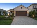 Charming single-Gathering home with attached two-car garage at 10112 Canaveral Cir, Sarasota, FL 34241