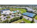 The clubhouse features a large pool, tennis courts, and plenty of parking at 2061 Willow Hammock Cir # 105, Punta Gorda, FL 33983