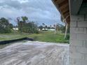Expansive lot view from construction site, primed for building with peaceful surroundings at 209 Annapolis Ln, Rotonda West, FL 33947