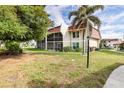 Back of condo with screened in porch at 311 Garvin St # 401C, Punta Gorda, FL 33950