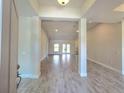 Spacious and bright living room with open floor plan and tile floors at 2201 Como St, Port Charlotte, FL 33948