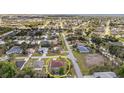 Aerial view of a residential area showing the location of the home at 23488 Almond Ave, Port Charlotte, FL 33954