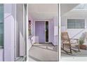 Inviting screened entrance offers a glimpse of the front door at 3940 Abbotsford St, North Port, FL 34287