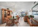 Bright and airy living room with stylish furnishings, and serene water views, perfect for relaxation at 25275 Rampart Blvd # 1602, Punta Gorda, FL 33983