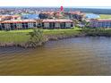 Waterfront condos with mature trees and lush green space near a lake at 93 Vivante Blvd # 9323, Punta Gorda, FL 33950