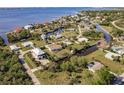 Wide aerial view of a charming community with access to stunning coastal waters at 156 Danforth Dr, Punta Gorda, FL 33980