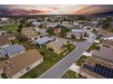 Neighborhood aerial view showcases the home's location, landscaping, and community features, plus easy access to neighborhood golf at 24321 Kintail Ct, Punta Gorda, FL 33980