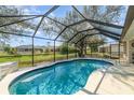 Relaxing pool with a screen enclosure providing a private outdoor retreat at 312 Mendoza St, Punta Gorda, FL 33983