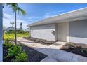 Exterior image of the condo showing the well-maintained landscaping at 14234 Heritage Landing Blvd # 1016, Punta Gorda, FL 33955