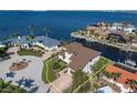 Waterfront home featuring a beautiful view, surrounded by other homes with boat docks at 8 Ocean Dr, Punta Gorda, FL 33950