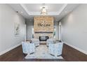 Cozy lobby with stone fireplace, stylish seating, and elegant lighting at 1484 Mableton Dr, Port Charlotte, FL 33953