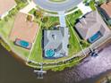 Aerial view of the property showcasing its desirable location on the water at 8774 Mystic Cir, North Port, FL 34287