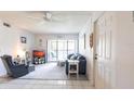 Cozy living room with white walls and tile flooring throughout at 1515 Forrest Nelson Blvd # L204, Port Charlotte, FL 33952