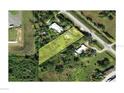 Overhead view of the property showcasing the layout and surrounding area, highlighting the lot at 2715 Taylor Rd, Punta Gorda, FL 33950