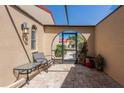 Relaxing courtyard with a tiled floor, covered ceiling, and seating area, perfect for outdoor enjoyment at 1780 Deborah Dr # 25, Punta Gorda, FL 33950
