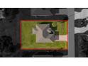 A birds eye view shows the entire lot with a manicured lawn at 359 Paramaribo St, Punta Gorda, FL 33983