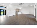 Spacious open-concept living area with tile flooring, high ceilings, and natural light at 24166 Colima Ct, Punta Gorda, FL 33955