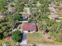 Aerial view of a private fenced in backyard featuring an enclosed pool at 3172 Sikeston Ave, North Port, FL 34286