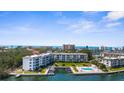 Luxury condo community offers waterfront living with private boat docks and a refreshing swimming pool at 600 Sutton Pl # 101B, Longboat Key, FL 34228
