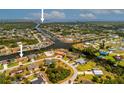 Stunning aerial view of the waterfront community and surrounding waterways at 4114 Yucatan Cir, Port Charlotte, FL 33948