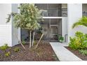 Inviting exterior view featuring a screened-in patio, perfect for enjoying the outdoors in comfort and privacy at 14281 Heritage Landing Blvd # 1418, Punta Gorda, FL 33955