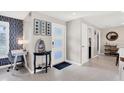 Inviting home entryway with coastal decor, tiled floors, and view into adjacent living spaces at 280 Belvedere Ct, Punta Gorda, FL 33950