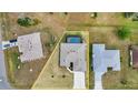Aerial view of the property highlighting the pool, backyard, and surrounding neighborhood at 474 Rio De Janeiro Ave, Punta Gorda, FL 33983