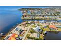 Stunning aerial view of waterfront homes with private pools and boat docks in a coastal community at 310 Severin Se Rd, Port Charlotte, FL 33952