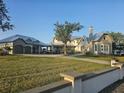Stunning home with lush lawn, detached garage, and ample parking at 310 Severin Se Rd, Port Charlotte, FL 33952
