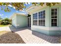 Inviting single-story home with paver driveway and well-maintained landscaping at 2241 Boxwood St, North Port, FL 34289