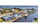 Gorgeous waterfront home with private dock, adjacent to canal in desirable community at 12387 Minot Ave, Port Charlotte, FL 33981