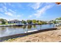 Scenic waterfront property with private dock and calm canal waters, perfect for boating at 12387 Minot Ave, Port Charlotte, FL 33981