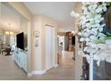 Open foyer showcasing the home's bright interior, tile floors, and seamless transition into living areas at 2304 Bonn Ct, Punta Gorda, FL 33983