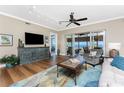Cozy living room with hardwood floors, stylish furnishings, and water views at 95 N Marion Ct # 226, Punta Gorda, FL 33950