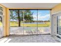 Relaxing screened-in patio with a stunning lake view, perfect for enjoying the outdoors at 25559 Heritage Lake Blvd # 25, Punta Gorda, FL 33983